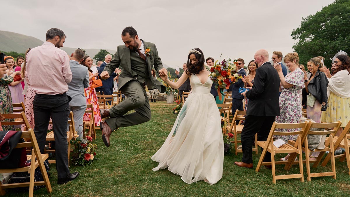 wedding ceremony outside at Plas Dinam