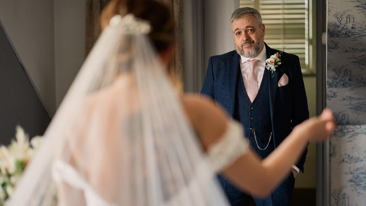 father of the bride looking emotional